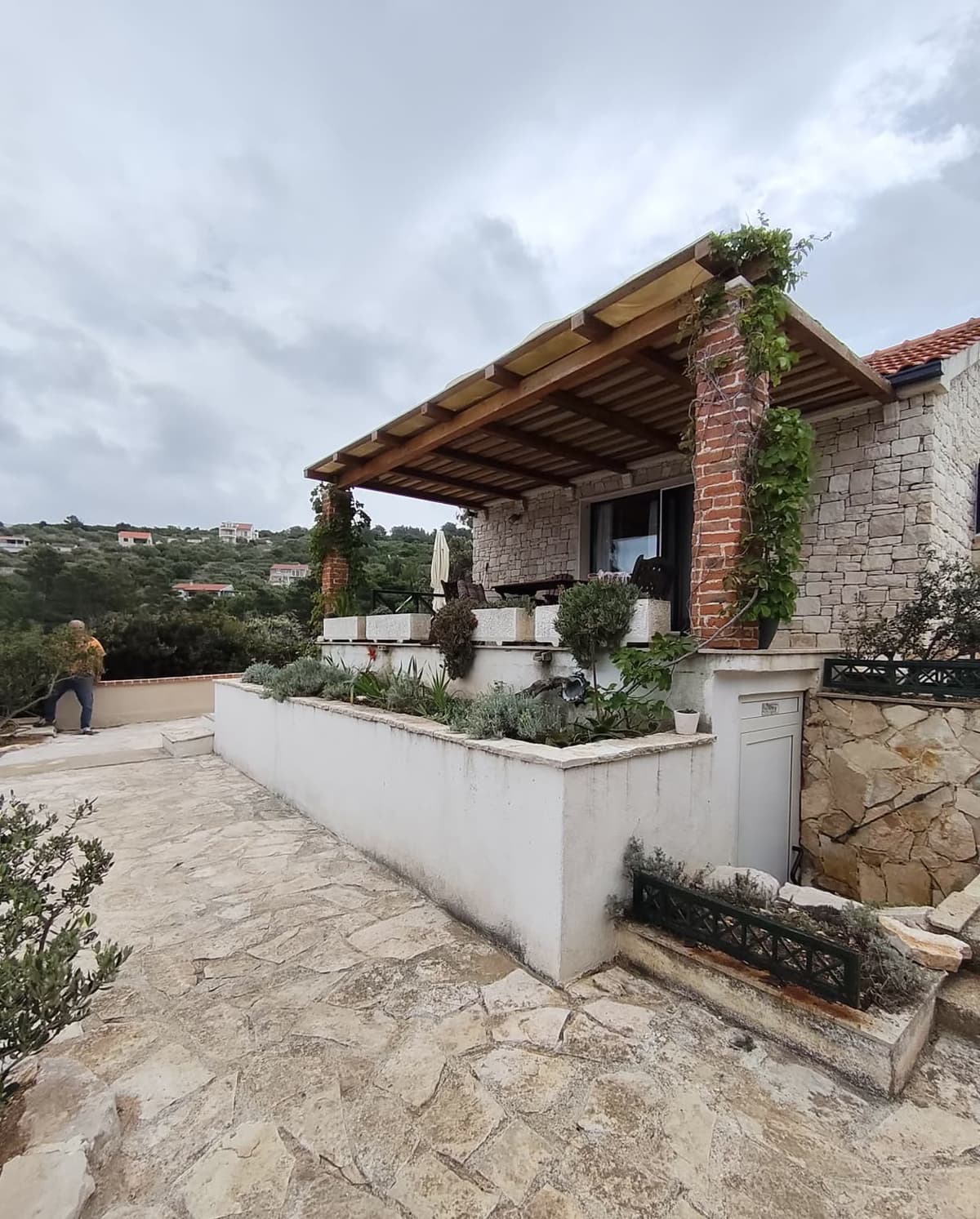 Stone path along the side of the house