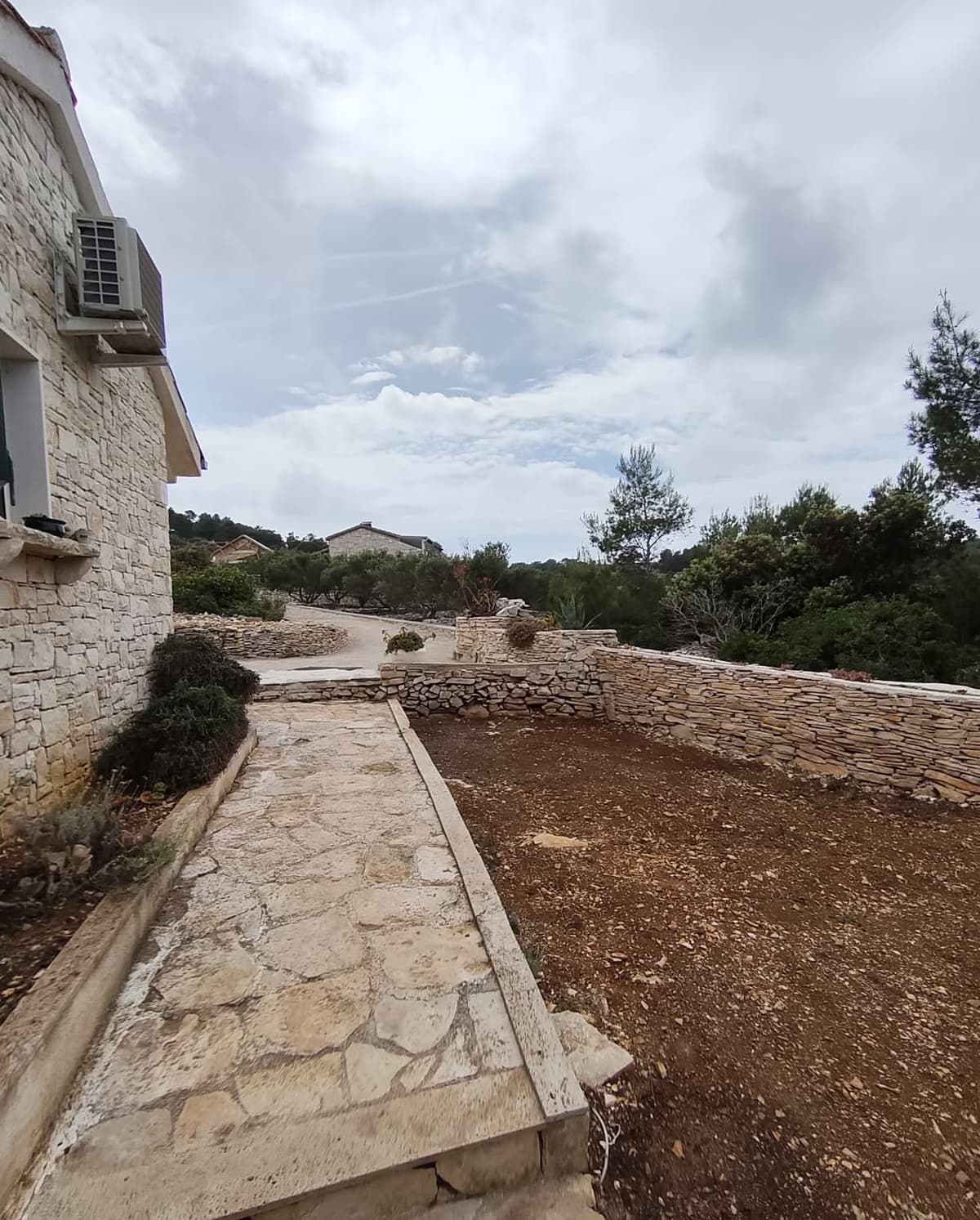 Path to the house with countryside view