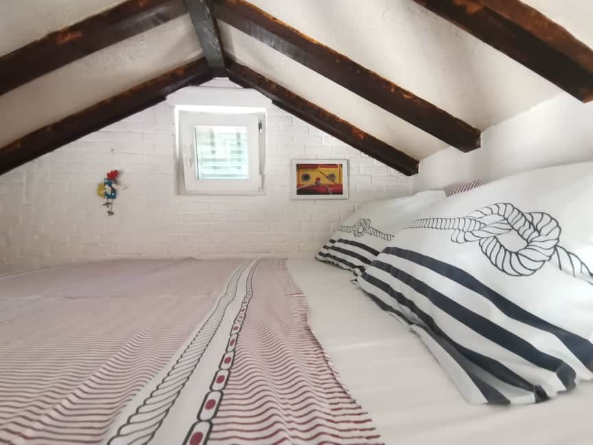 Loft sleeping area with window