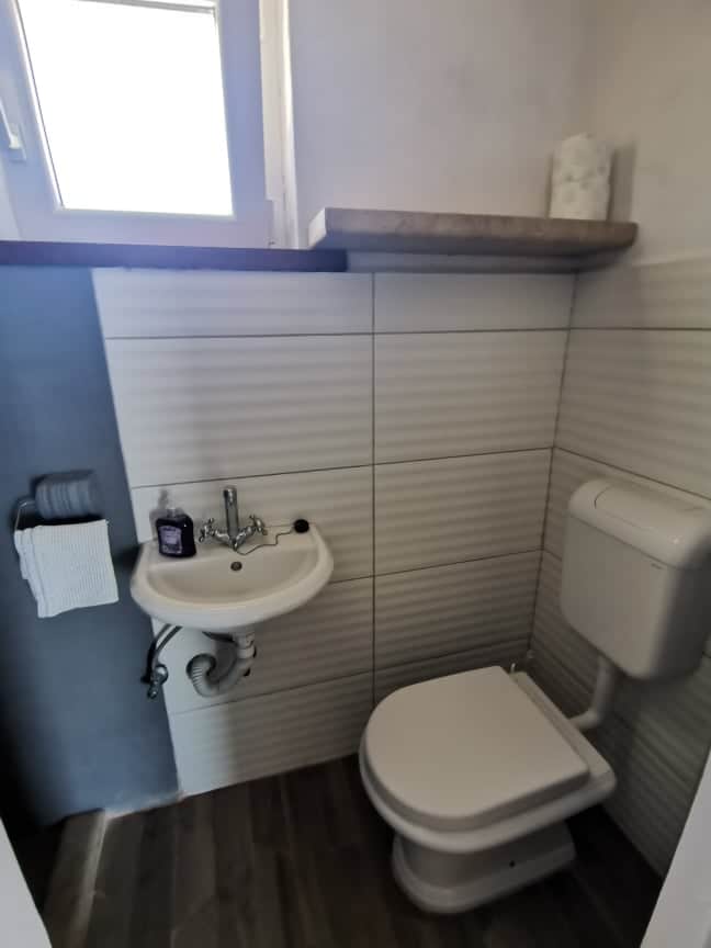 Bathroom with toilet and sink