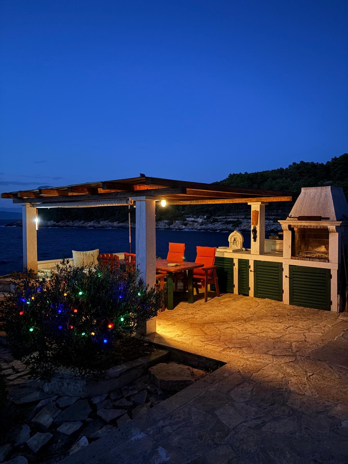 Terrace with barbecue area at night