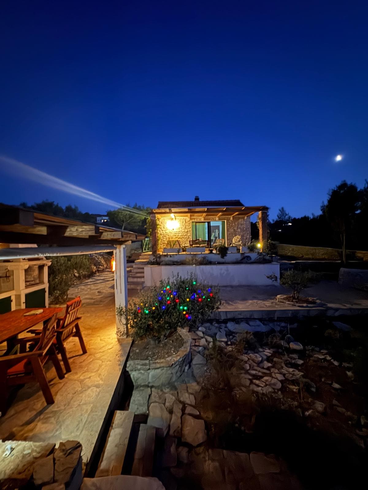 Illuminated outdoor area and garden